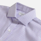 Close-up of a Ledbury men's dress shirt in a light purple and white gingham check pattern, showing the collar and button placket.