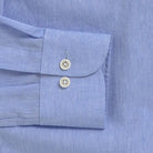 Close up of the sleeve on a men's cotton/linen light blue shirt by Ledbury