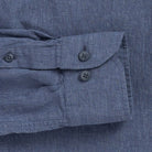 Double button barrel cuff detail on a blue cotton/linen shirt by Ledbury
