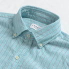 Close-up of collar detail on the Sea Green Barretto Stripe cotton-linen shirt