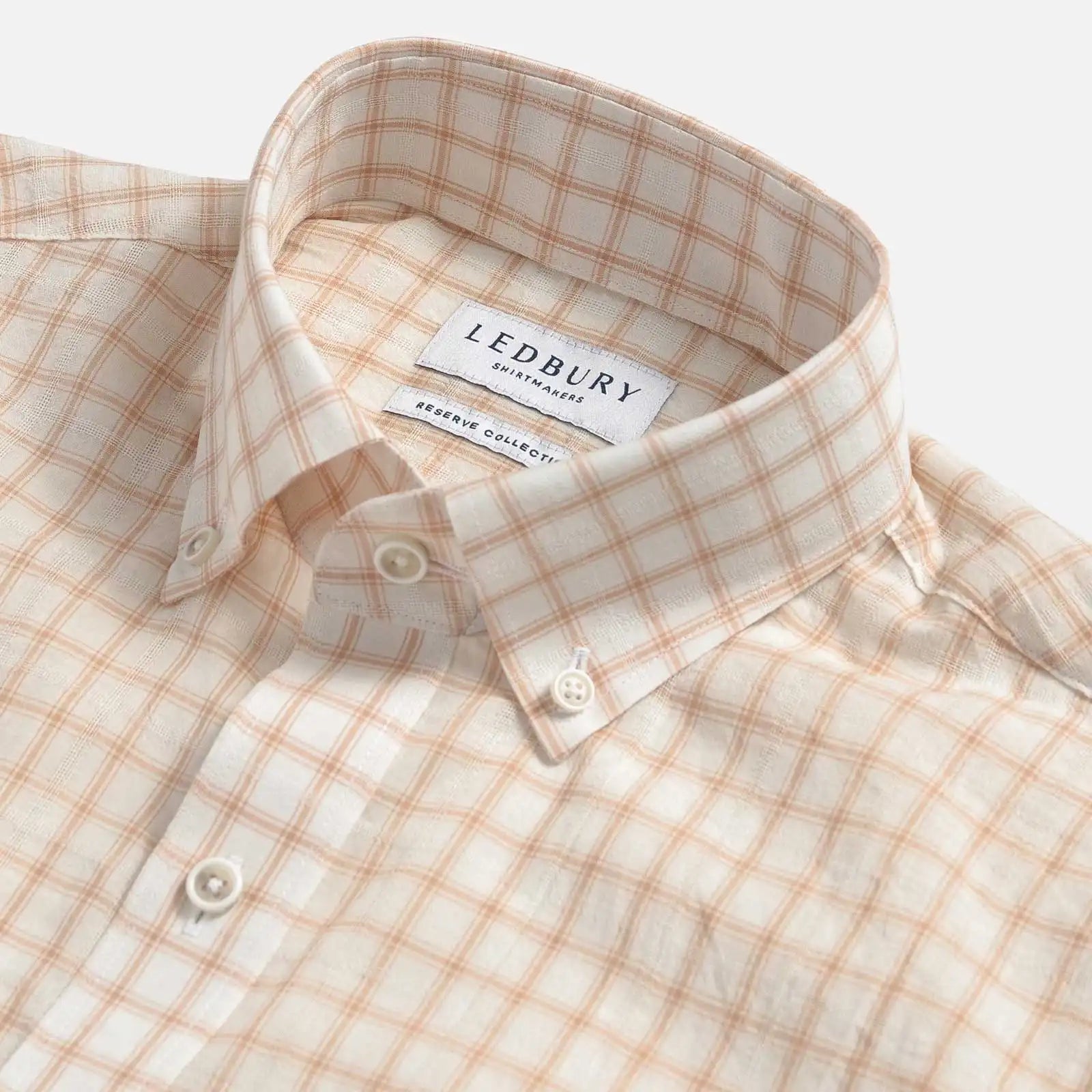 Collar detail on a pale pink check shirt, Ledbury