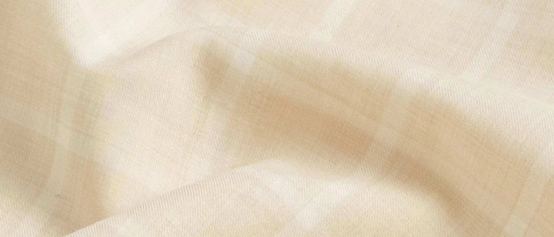 Close-up fabric detail of the wheat Albini Pritchard Italian checkered dress shirt
