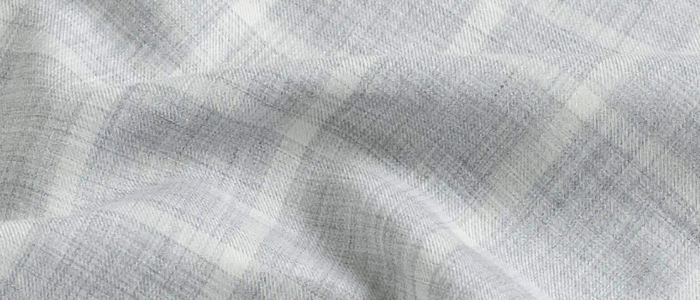 Close-up fabric detail of the grey Albini Pritchard Italian checkered dress shirt