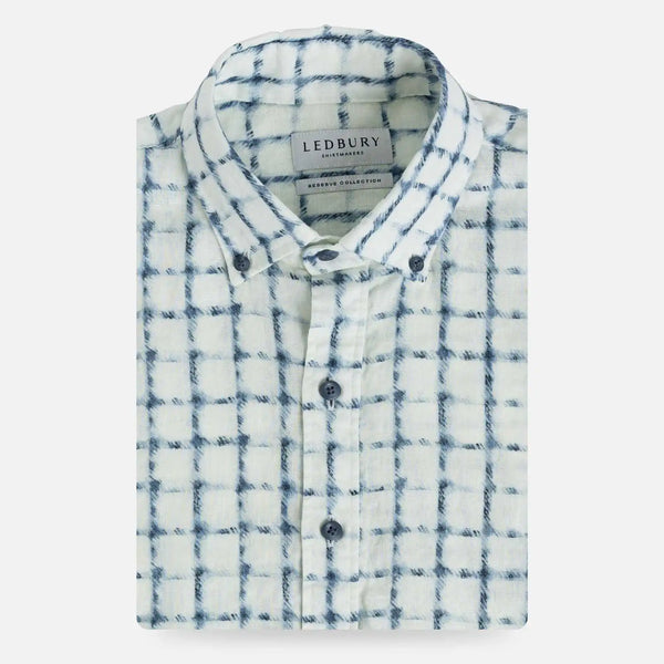 Breathable Italian linen shirt with blue and white plaid pattern, flat lay