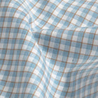 Sky blue Newhall check fabric texture - luxurious weave in light blue tones