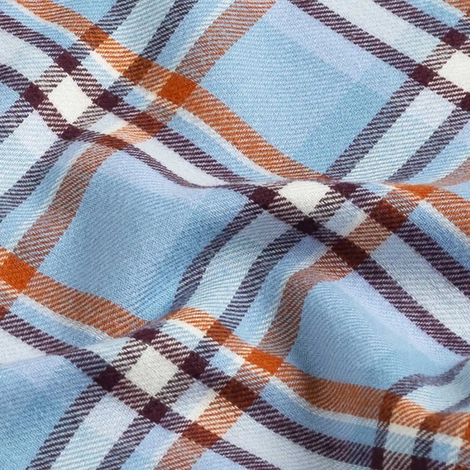 Sky blue Oakhurst flannel fabric close-up - luxurious brushed texture in light blue