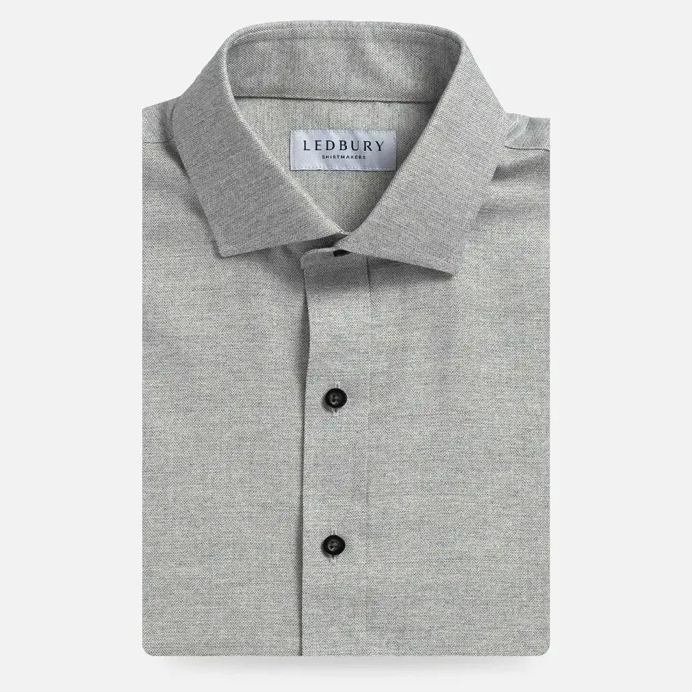 Grey heathered button down shirt with dark buttons flay lay