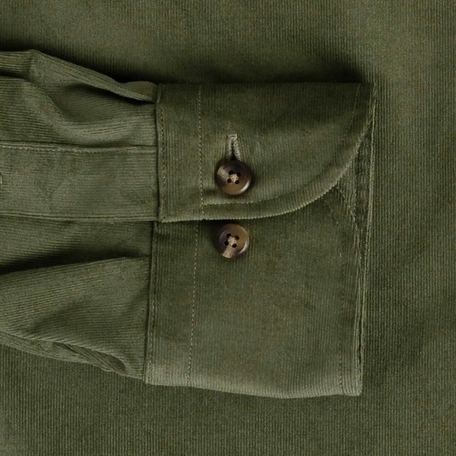 Olive green corduroy shirt cuff and sleeve construction detail