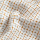 Burnt orange Mabbett check fabric detail - luxurious weave and rich color