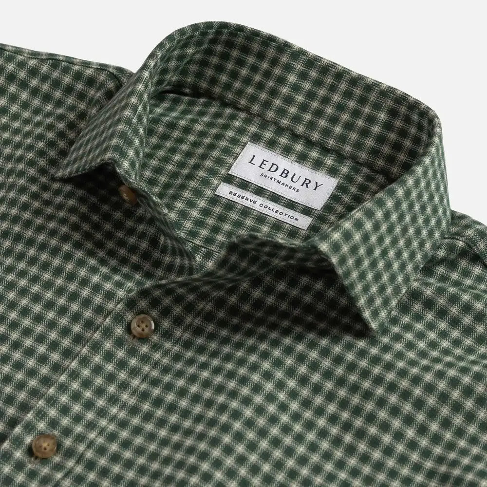 Close-up of a green and white checkered button-down shirt collar with a visible LEDBURY brand label.