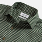 Close-up of a green and white checkered button-down shirt collar with a visible LEDBURY brand label.
