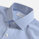 Close-up of a Ledbury men's dress shirt in a light blue and white stripe pattern, showing the collar, button, and brand label.