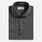A folded dark gray textured dress shirt with a pointed collar and button-down front, shown on a light gray background. The inner neck label reads LEDBURY.