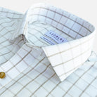Close-up of a white and beige windowpane plaid dress shirt by Ledbury, showing the collar