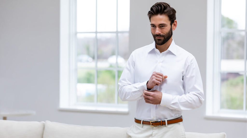 Man wearing a custom made white dress shirt