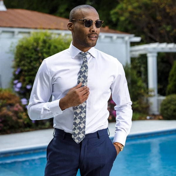 Man wearing white Canon performance twill dress shirt - professional business attire