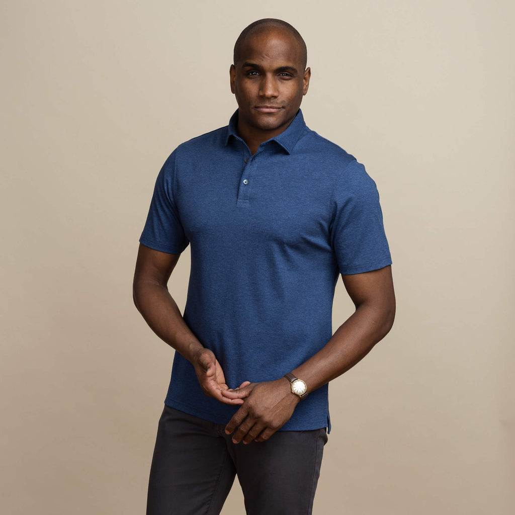 Male model wearing a navy blue Ledbury Polo